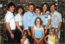 Duane stands with his children and grandchildren at a family reunion in 1981