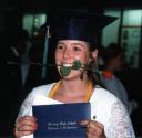 Biting a rose during High School Graduation in 1995