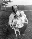 Arch holds daughter Velma and their dog Trixie in September, 1923