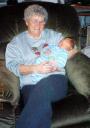 Florence holds her grandson, Noah, in December 2003
