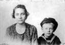 Malvina poses with her son Raymond for a passport photograph in 1922